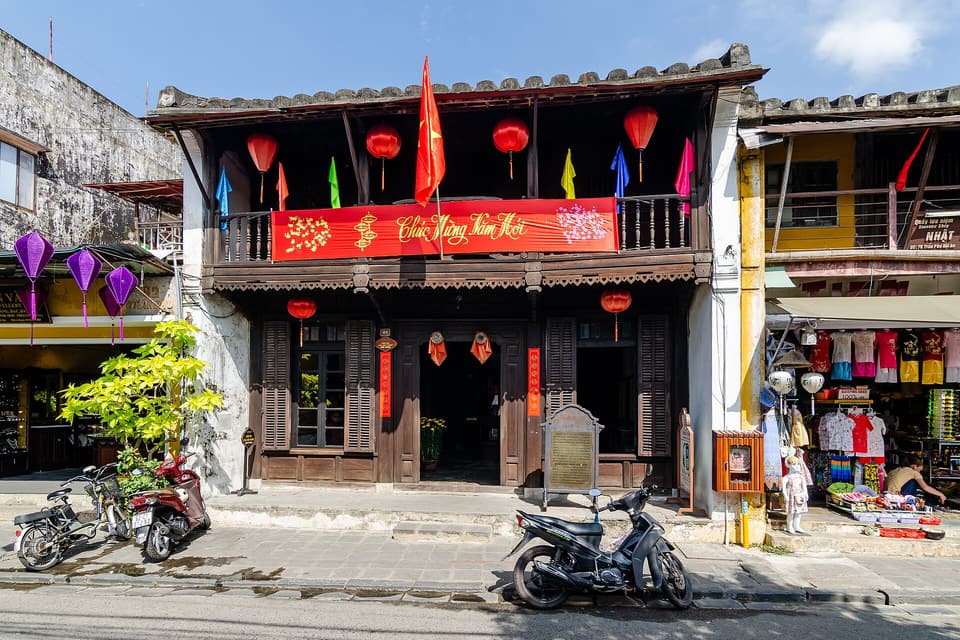 A timber shop house decorated with lanterns in Hoi An Ancient Town